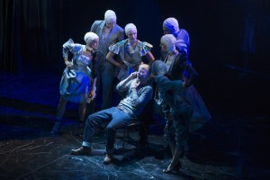 LtoR Eloise Hymas, George Hill, Rachel Louisa Maybank, Stephen Wight (seated) as Lee, Jordan Kennedy, Amber Doyle and Sophie Apollonia in McQueen credit S