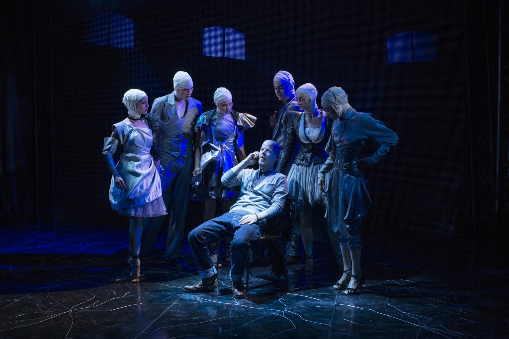 LtoR Eloise Hymas, George Hill, Rachel Louisa Maybank, Stephen Wight (seated) as Lee, Jordan Kennedy, Amber Doyle and Sophie Apollonia in McQueen